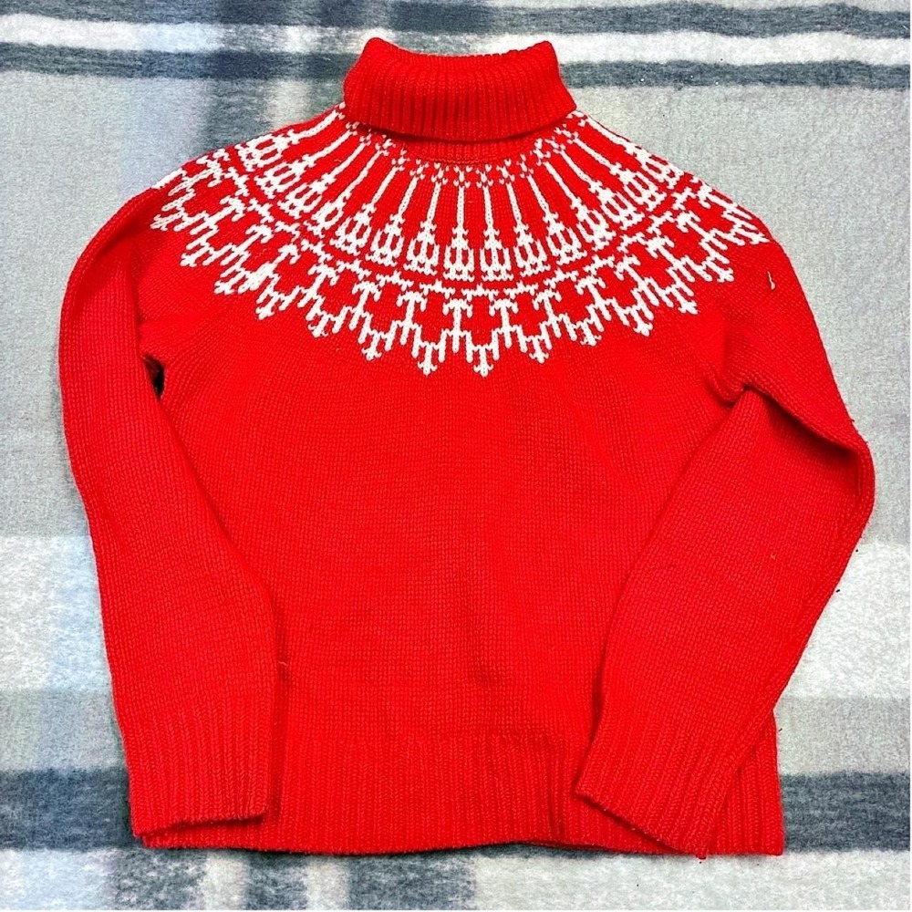 the Tory Sport Merino Fair Isle Turtleneck Sweater.
